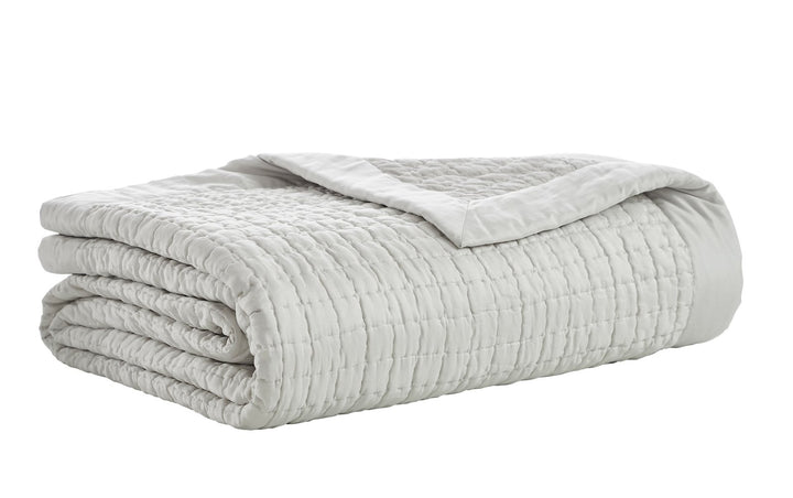 CL-198-11096_5|Folded light grey coverlet featuring a subtle grid-stitched texture, offering a cozy and stylish addition to modern bedroom decor.