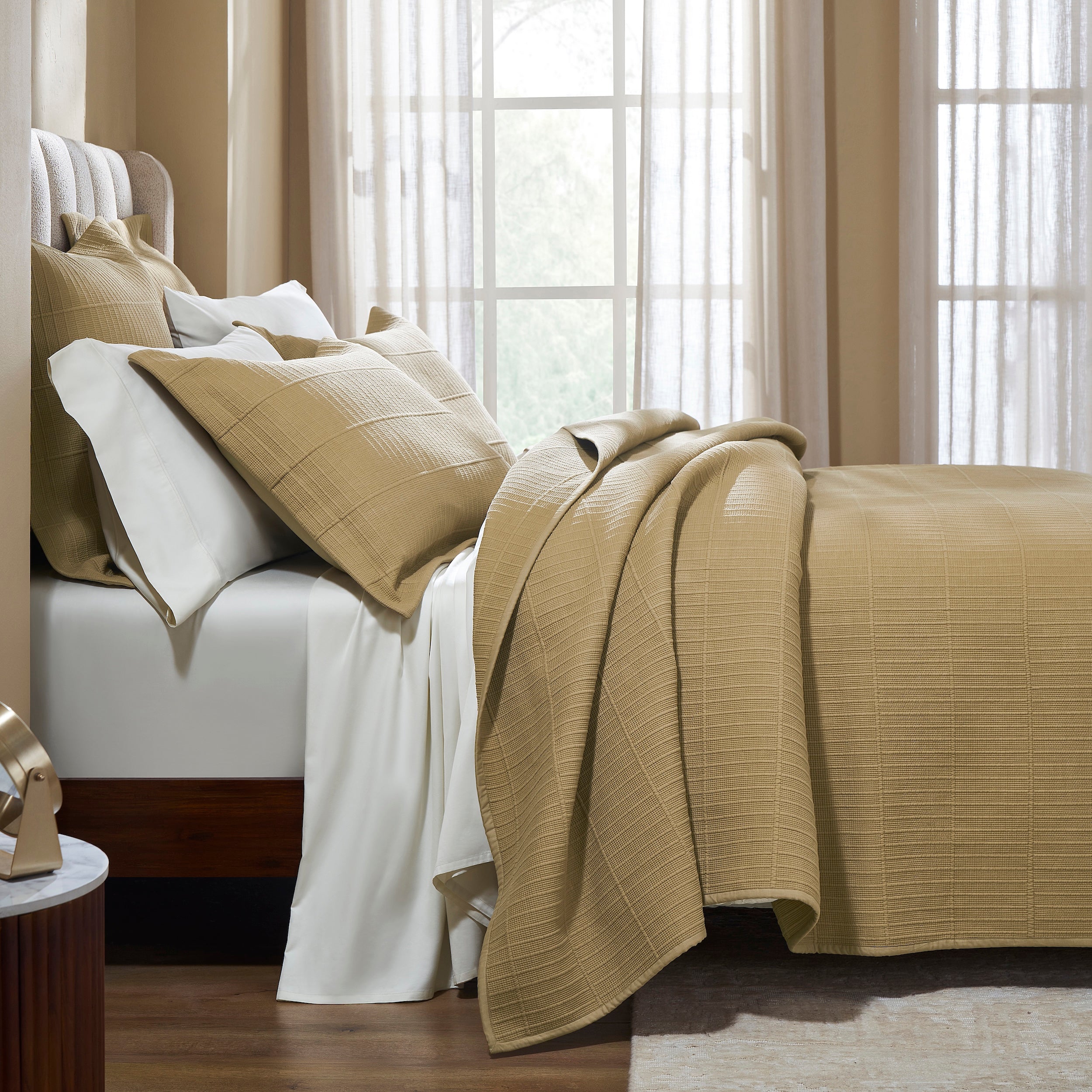CL-269-9496_3|Cozy beige textured coverlet neatly folded on a bed, showcasing its soft texture and inviting neutral bedroom appeal.