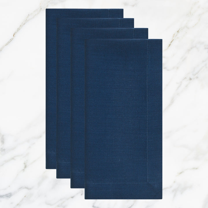 NP-4801-2020_1|Set of four folded navy blue linen-feel cloth dinner napkins, durable and elegant for dining, parties, or everyday use.