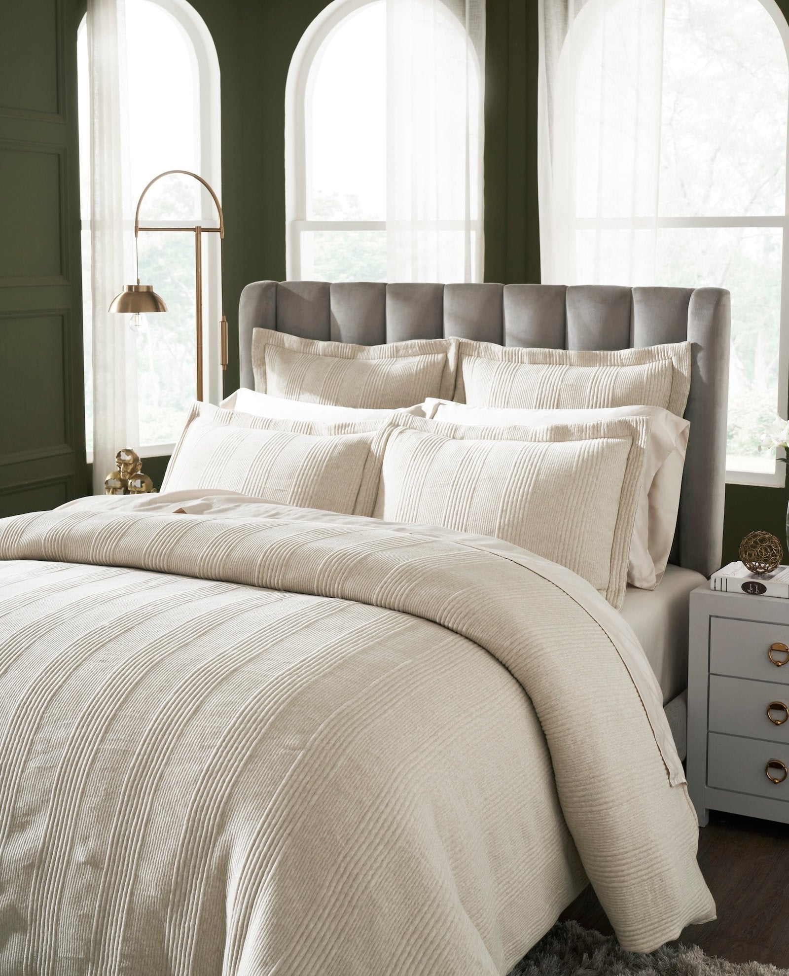 DT-040-9092_3|Detailed view of a beige textured duvet cover and pillows with subtle vertical stripes, adding warmth and sophistication.