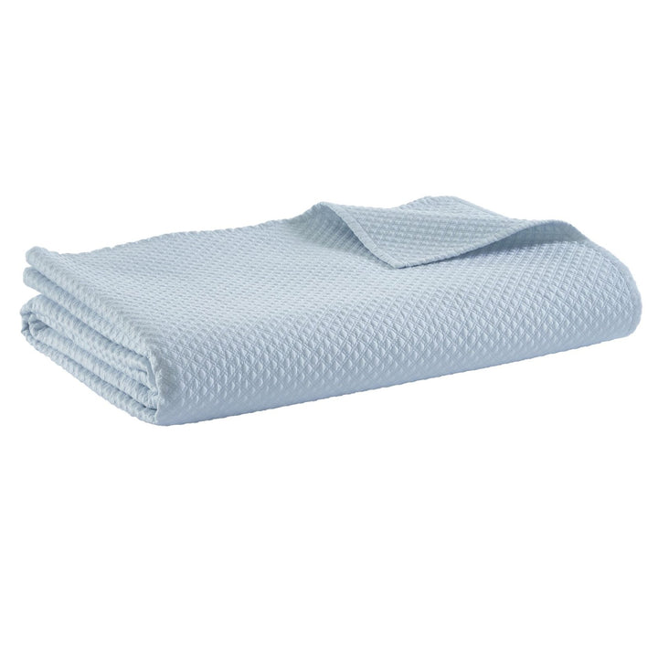 CL-251-11096_6|Folded light blue textured coverlet, showcasing its delicate diamond pattern and refreshing aesthetic appeal.