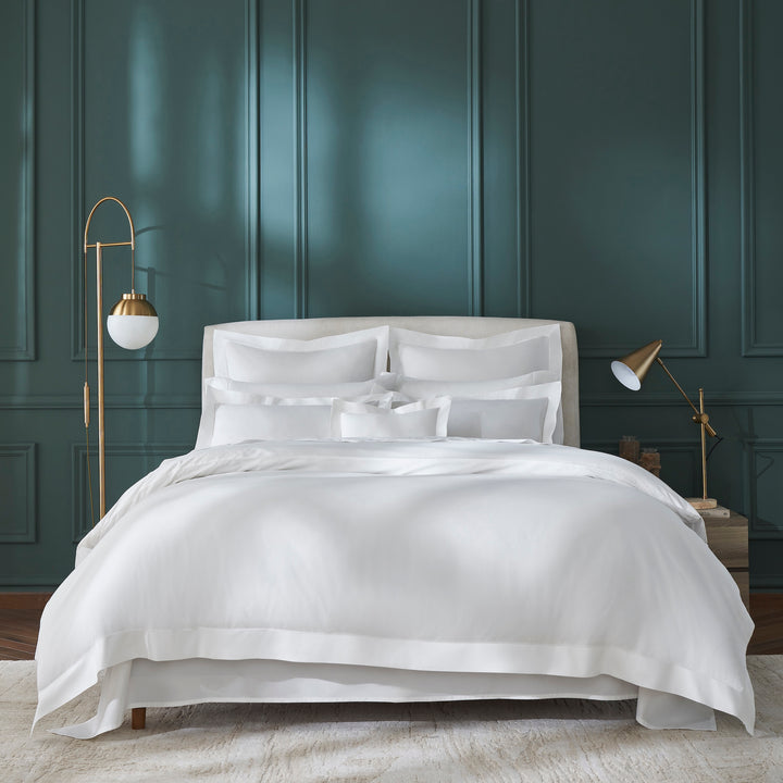 DT-058-6886_1|Crisp white luxury duvet cover on a neatly made bed in an elegant bedroom setting. Perfect for sophisticated bedding.