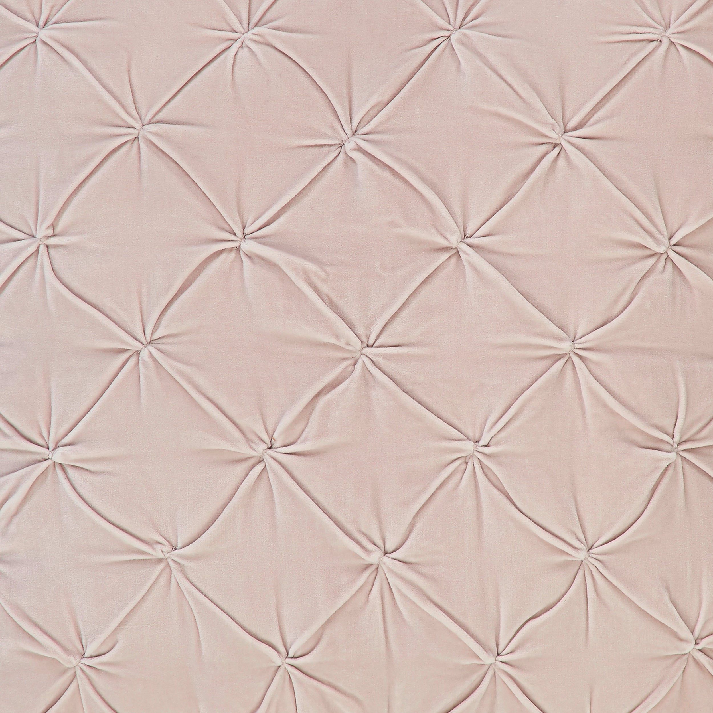 ES-325-2626_2|Close-up of blush pink velvet fabric with a sophisticated diamond quilted tufted pattern, perfect for elegant decor.