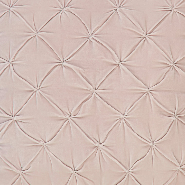 ES-325-2626_2|Close-up of blush pink velvet fabric with a sophisticated diamond quilted tufted pattern, perfect for elegant decor.