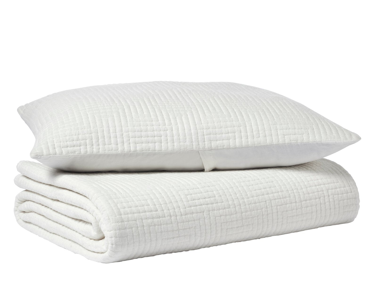 CL-199-11096_6|White quilted coverlet with a distinctive geometric maze pattern, folded neatly with a matching decorative pillow.