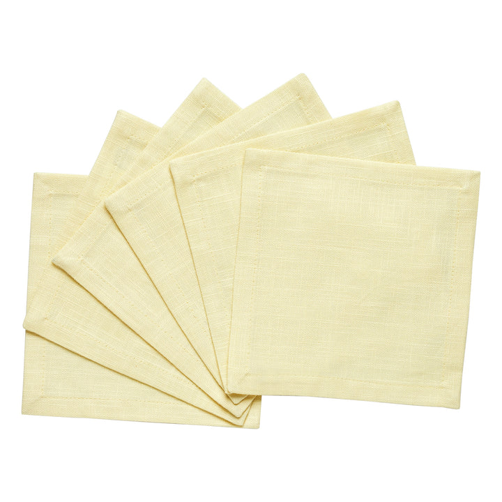 CNP-4907-66_2|Collection of light yellow reusable linen fabric dinner napkins, neatly fanned on a crisp white background for versatile styling.