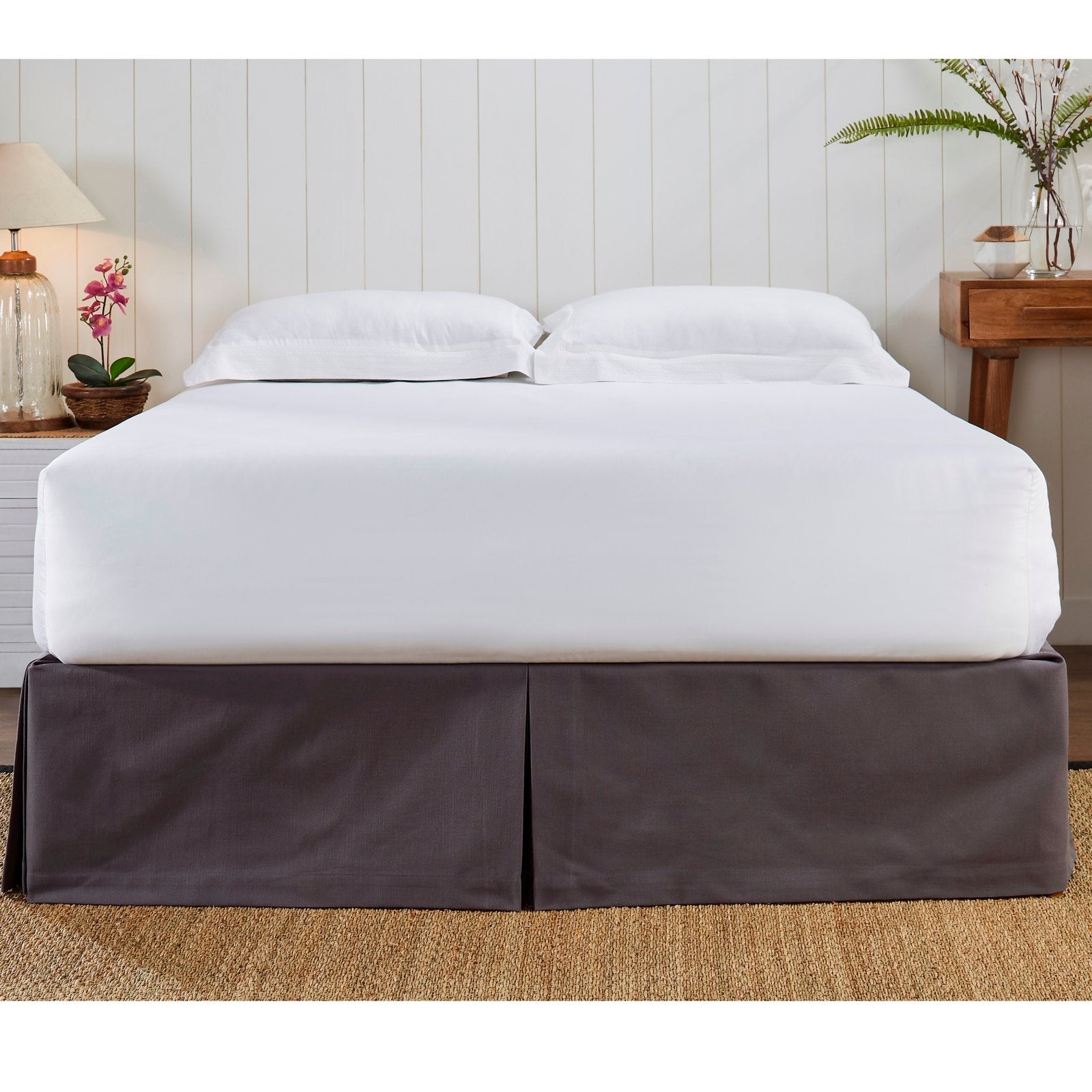 BS-107-7880_2|Elegant dark grey panel bed skirt with pleated corners, adding a tailored finish to bedroom decor. Conceals under-bed storage beautifully.