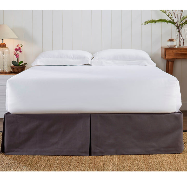 BS-107-7880_2|Elegant dark grey panel bed skirt with pleated corners, adding a tailored finish to bedroom decor. Conceals under-bed storage beautifully.