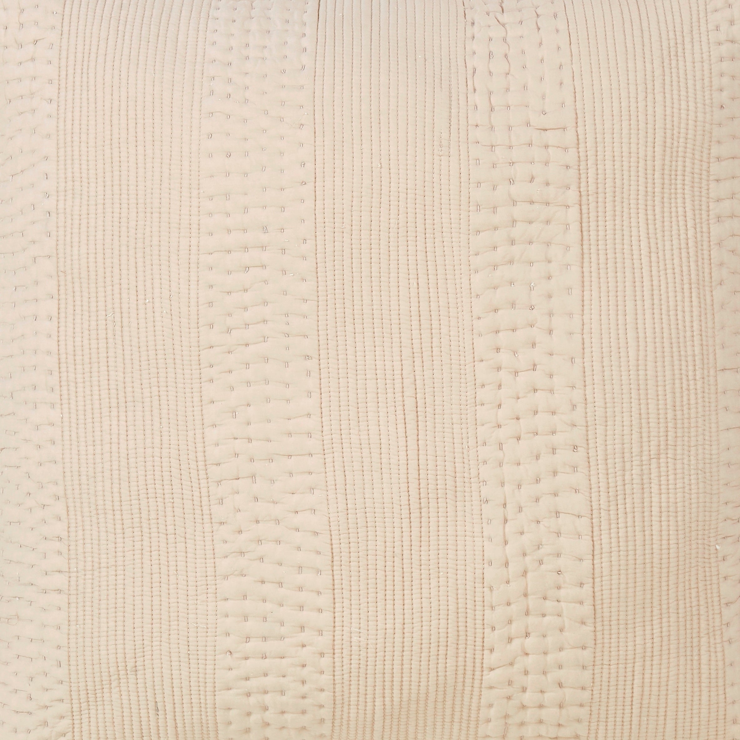 SS-164-2026_2|Detailed close-up of a luxurious neutral beige quilted coverlet fabric, showcasing its intricate vertical striped stitching pattern. Enhances bedding.