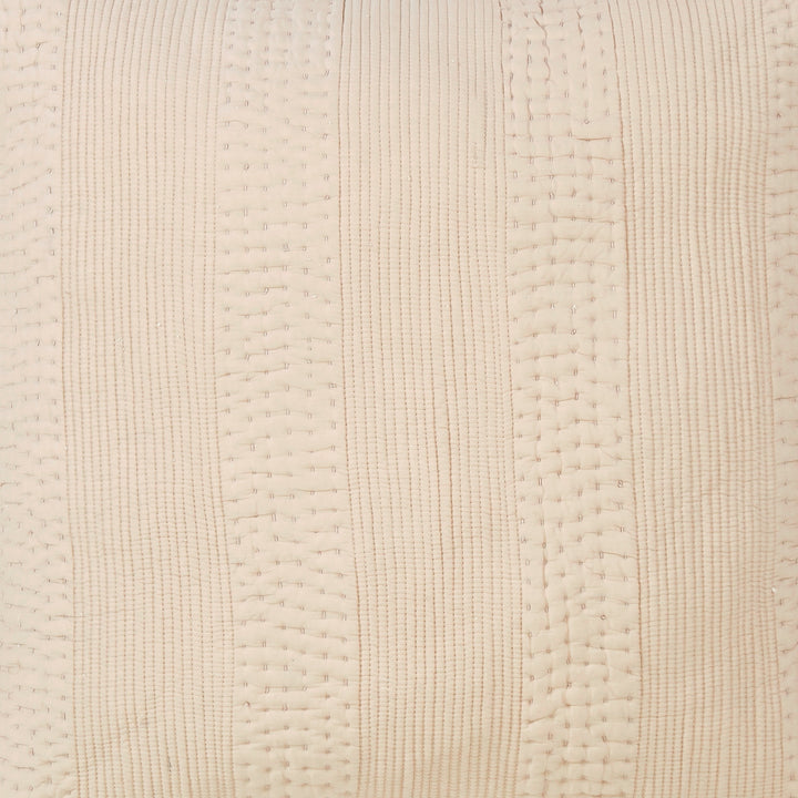 SS-164-2026_2|Detailed close-up of a luxurious neutral beige quilted coverlet fabric, showcasing its intricate vertical striped stitching pattern. Enhances bedding.