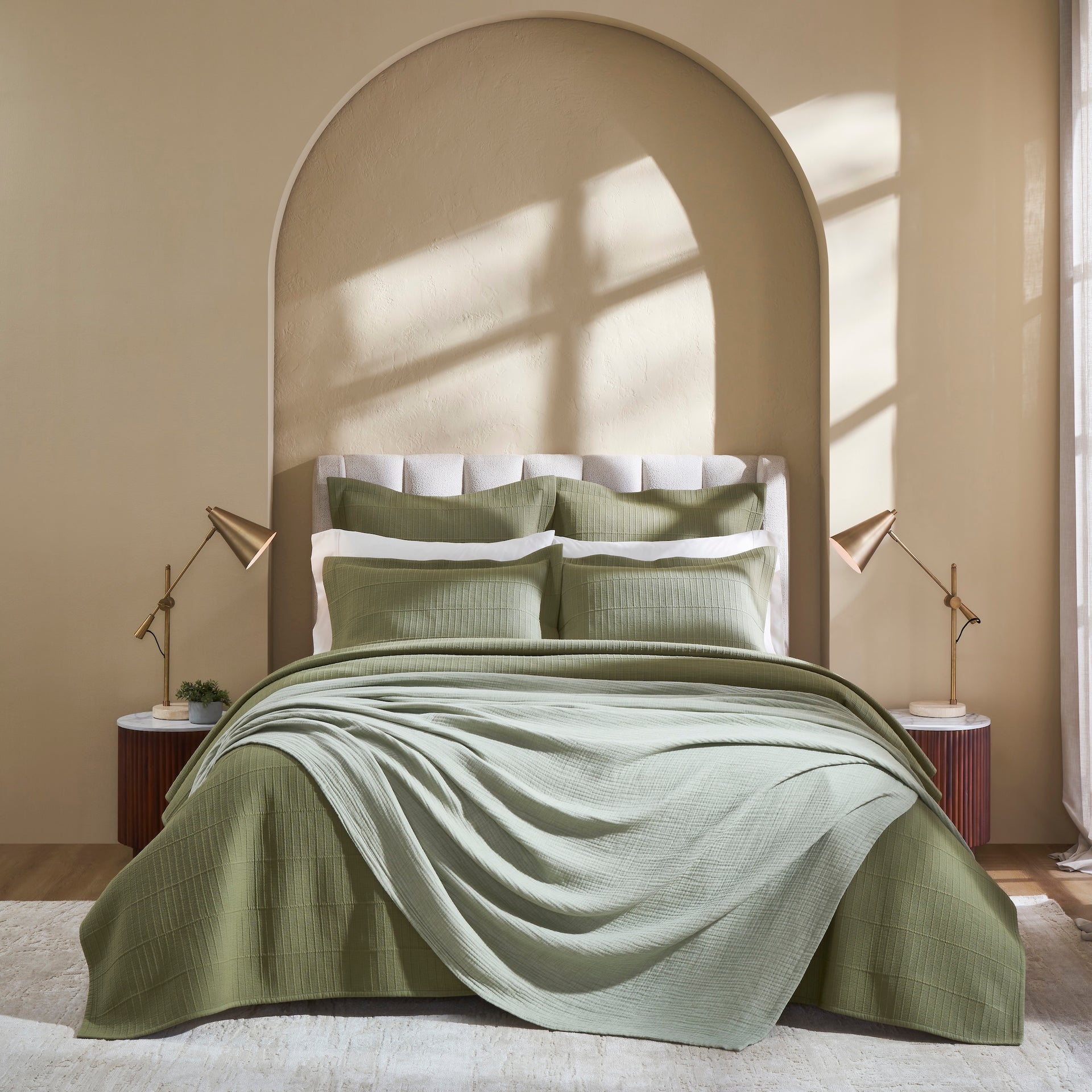 CL-268-X_1|Stylish green coverlet and pillows, layered with light green throw. Perfect for elegant bedroom decor, adding comfort and color.