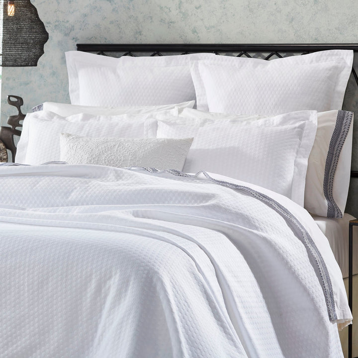 CL-174-11096_6|Plush white coverlet with a contemporary textured bubble pattern, enhancing comfort and style in any bedroom.