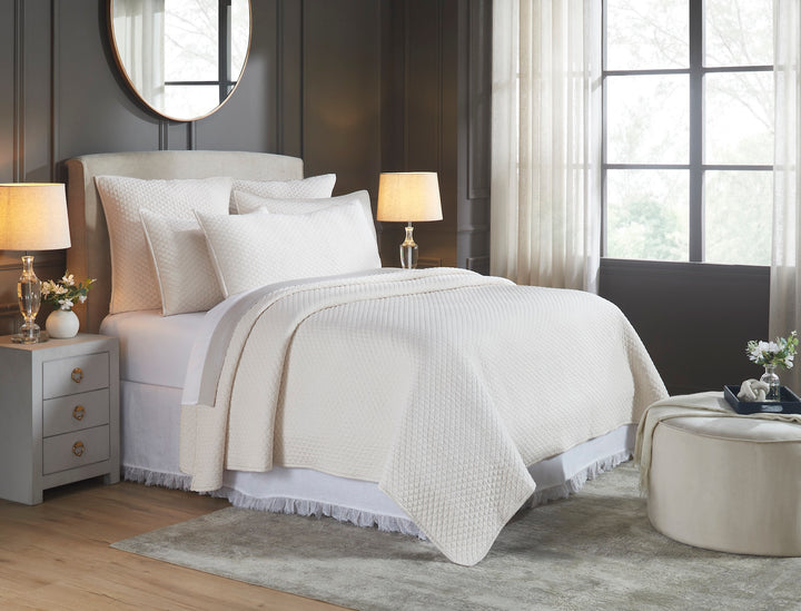 CL-265-9496_2|Serene bedroom showcasing a white diamond quilted coverlet with matching pillows. Luxurious and sophisticated bedding for comfort.