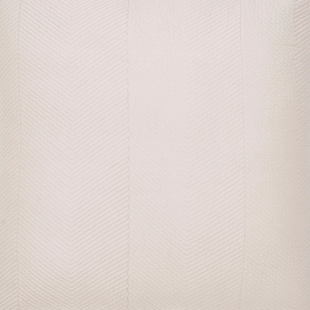 SWT-171-7.8_1|Soft beige quilted fabric presenting an elegant, subtle chevron design, perfect for sophisticated bedding or home decor.