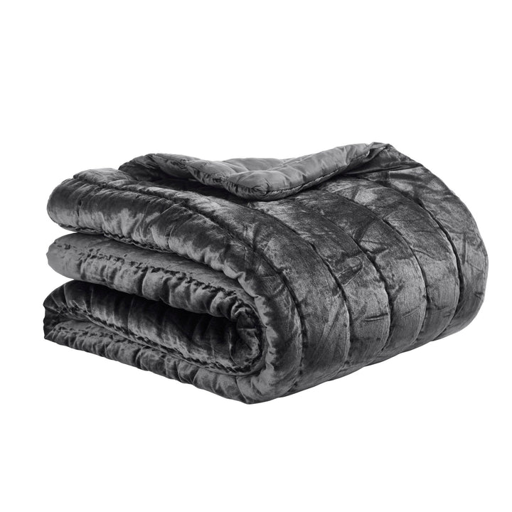 QT-338-9496_5|Plush dark grey velvet quilt, neatly folded, showcasing sophisticated horizontal channel stitching for modern bedroom comfort.