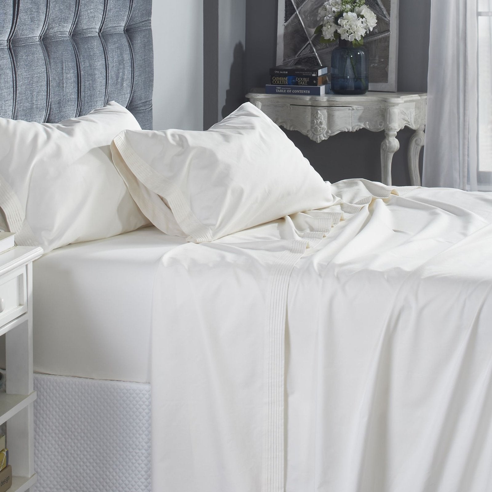 QSS-522-6080_4|Crisp white 100% cotton sheets with elegant pleated details, offering breathable comfort and a sophisticated bedroom style.