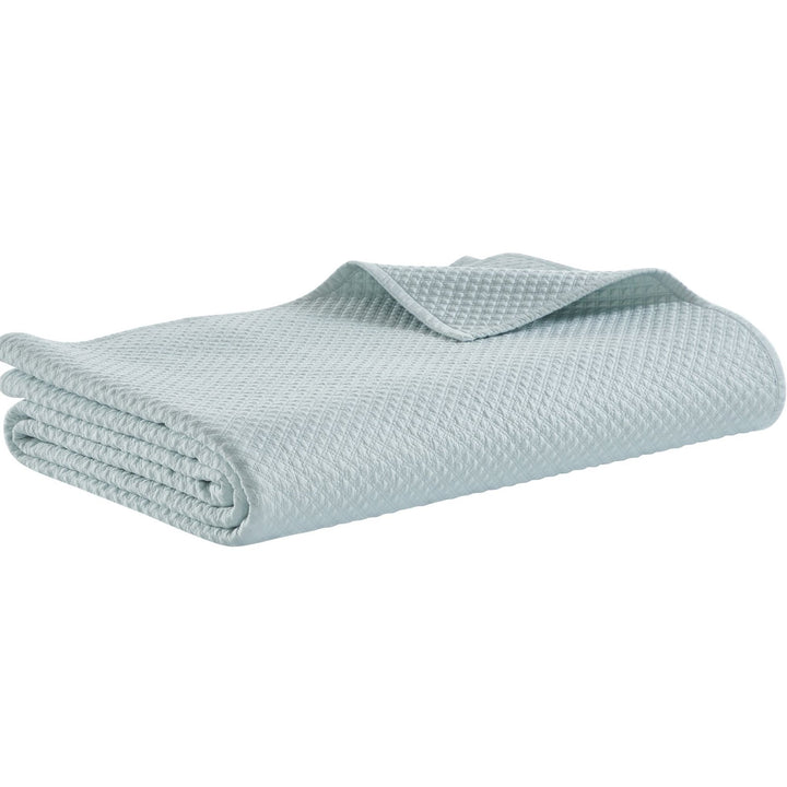 CL-252-11096_6|Perfectly folded refreshing mint green quilted coverlet, showcasing its elegant texture and versatile soft bedding appeal.
