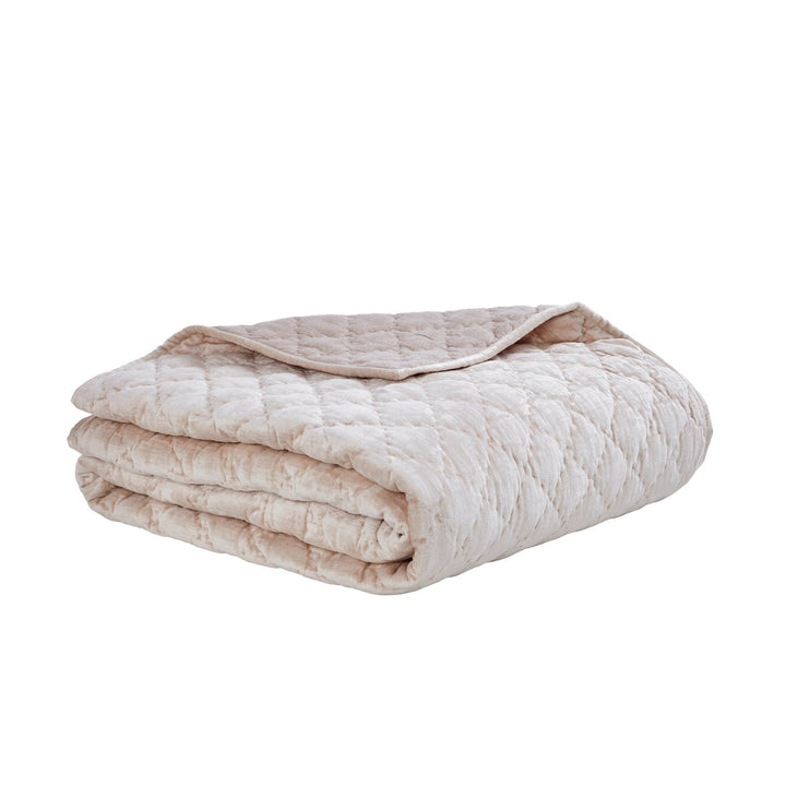 QT-342-11096_3|Plush blush pink quilt with a charming diamond texture, folded, providing cozy warmth and a chic look for bed.