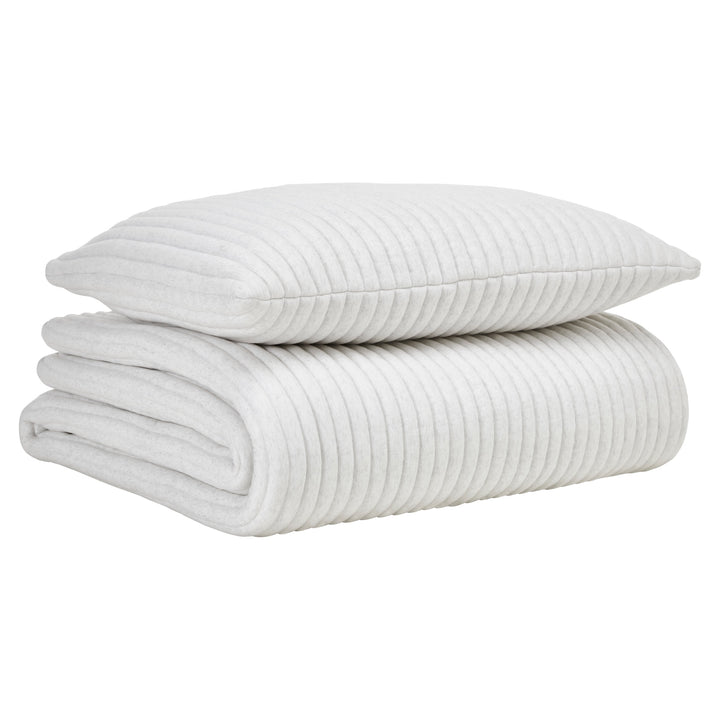 QT-374-11096_5|Folded light grey ribbed quilt with a matching textured pillow, showcasing soft, comfortable bedding. Ideal for any bed.