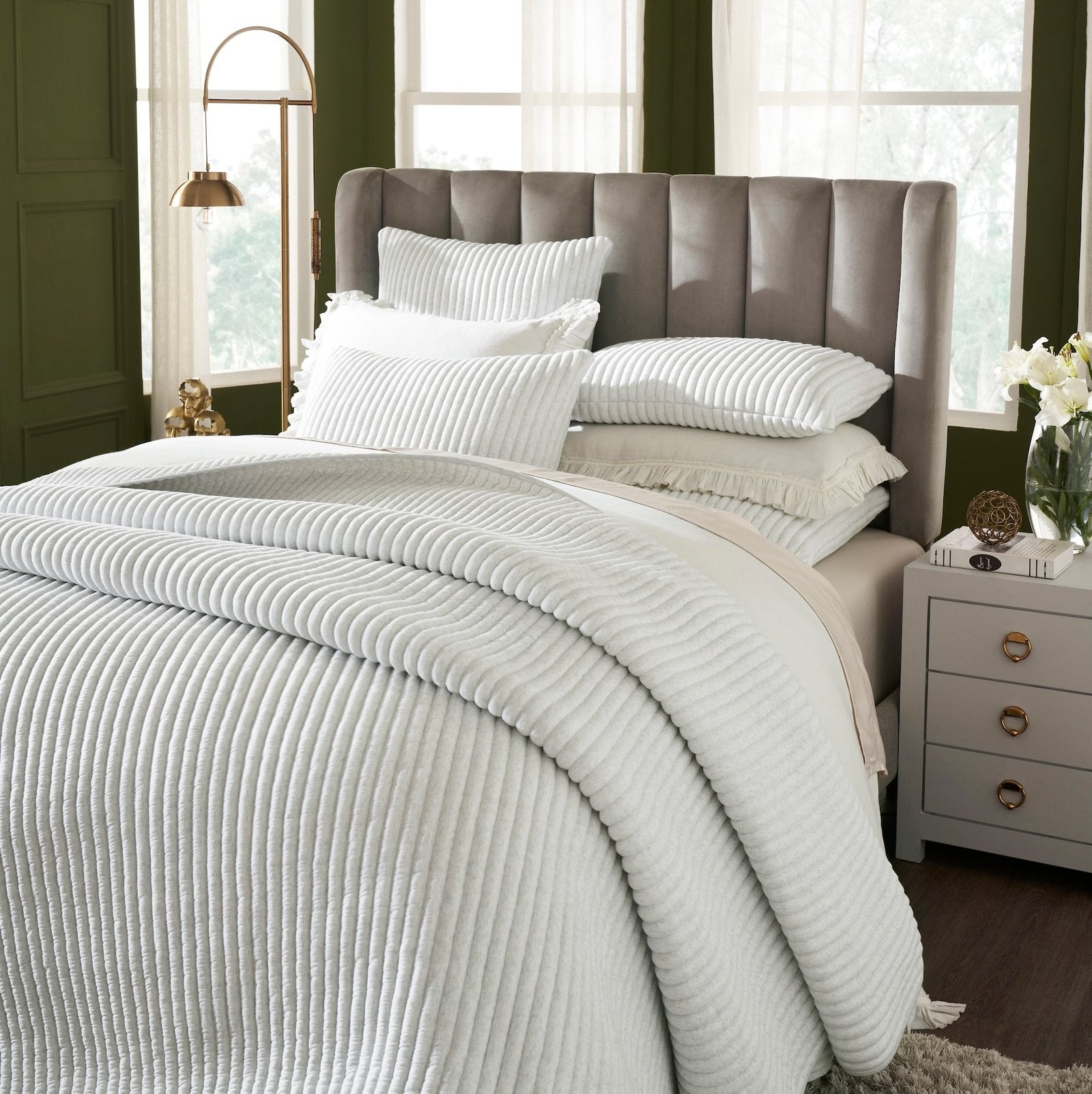 QT-367-9496_3|Plush white corduroy textured quilt and matching pillows, creating a serene and comfortable bedding ensemble.