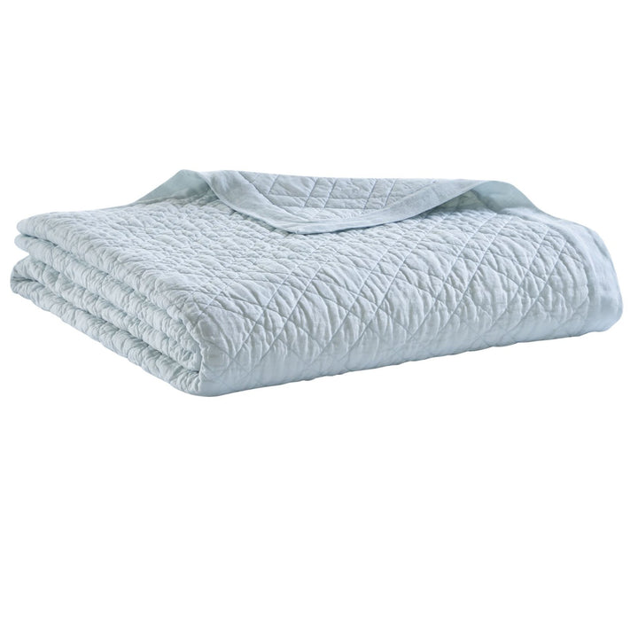 CL-255-11096_5|Soft light blue quilted coverlet, neatly folded. Perfect serene bedding with a modern diamond pattern for comfort.