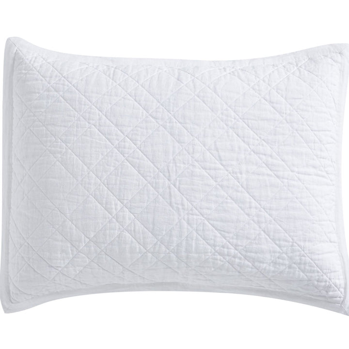 SS-253-X_1|Crisp white quilted pillow sham with diamond pattern, adding a classic touch to any elegant bedroom decor.