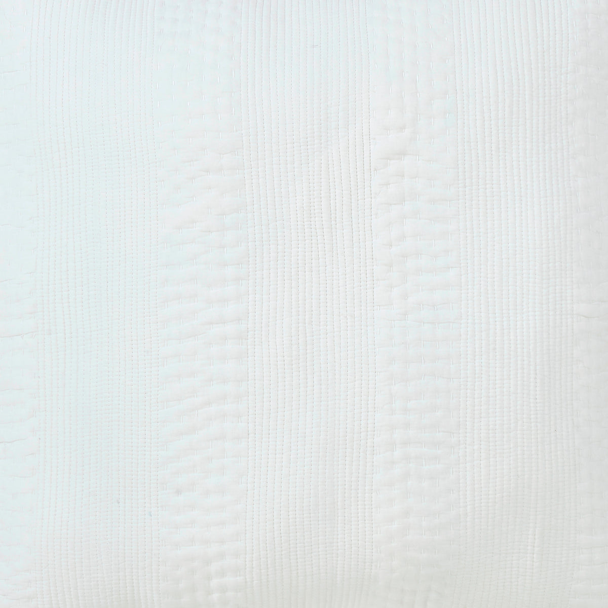 CL-163-9496_2|Close-up of a crisp white coverlet, showcasing its subtle, finely textured pattern and elegant, clean aesthetic.