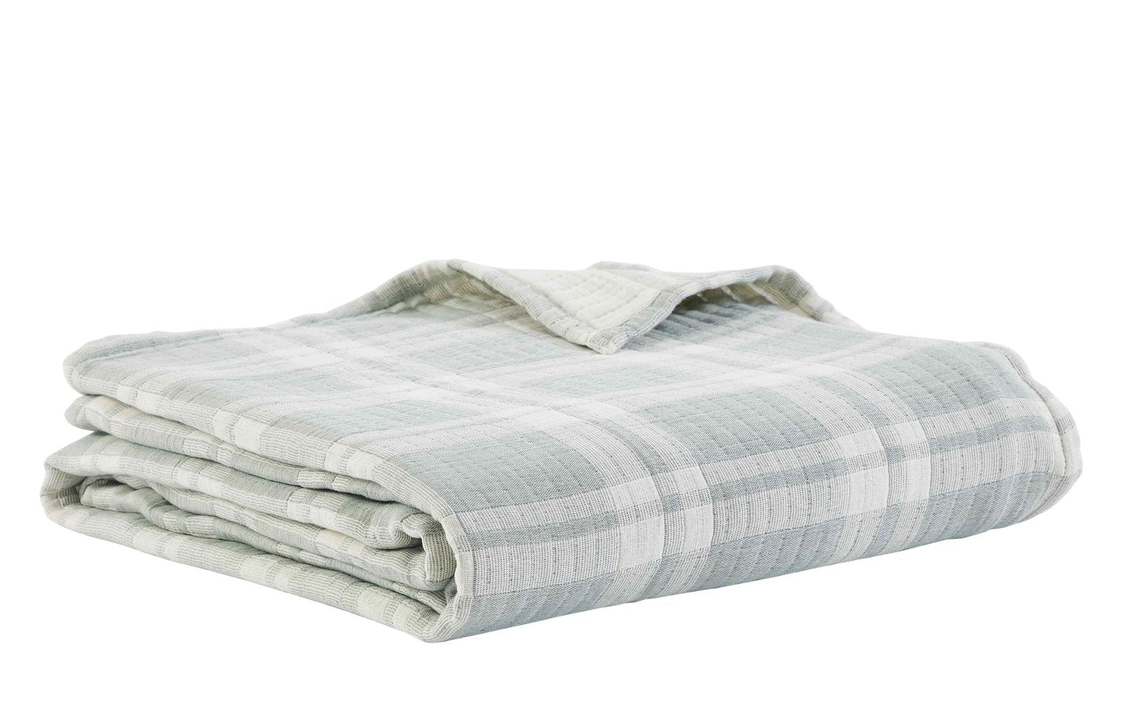 BT-119-11096_3|Neatly folded sage green and white plaid quilted blanket, showcasing its soft texture and inviting design for comfort.