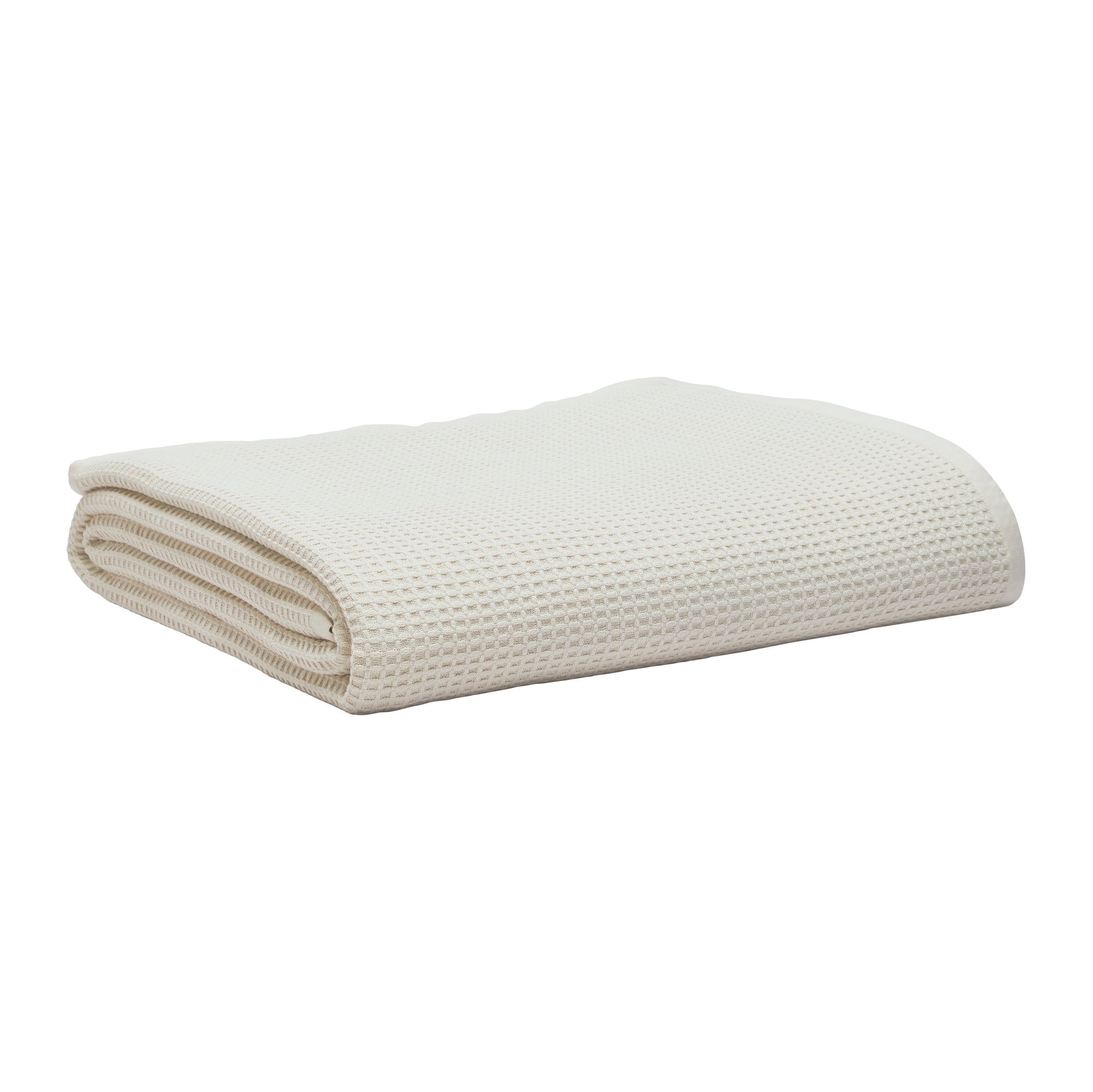 BL-867-11096_3|Folded cream waffle weave blanket. Soft, breathable cotton throw blanket for bed or sofa, adding texture and warmth to any room.