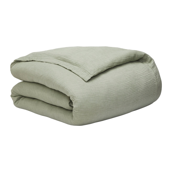 DT-051-10692_10|Light green textured muslin duvet cover, neatly folded. Soft, breathable bedding for a tranquil bedroom aesthetic.