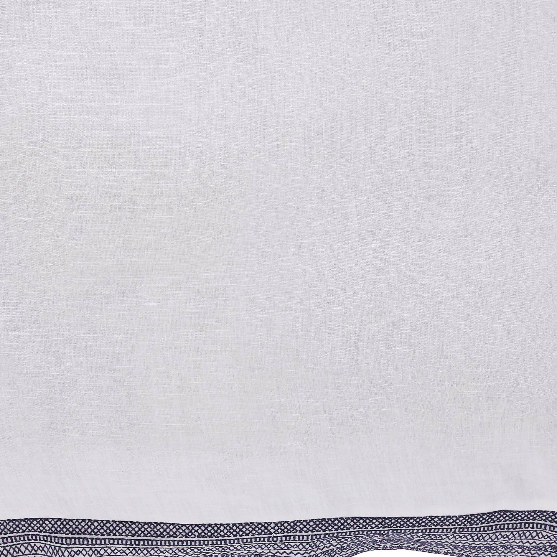 SWT-016-7.8_1|Elegant white linen pillow fabric with a distinctive black geometric embroidered border, adding sophistication to home decor.