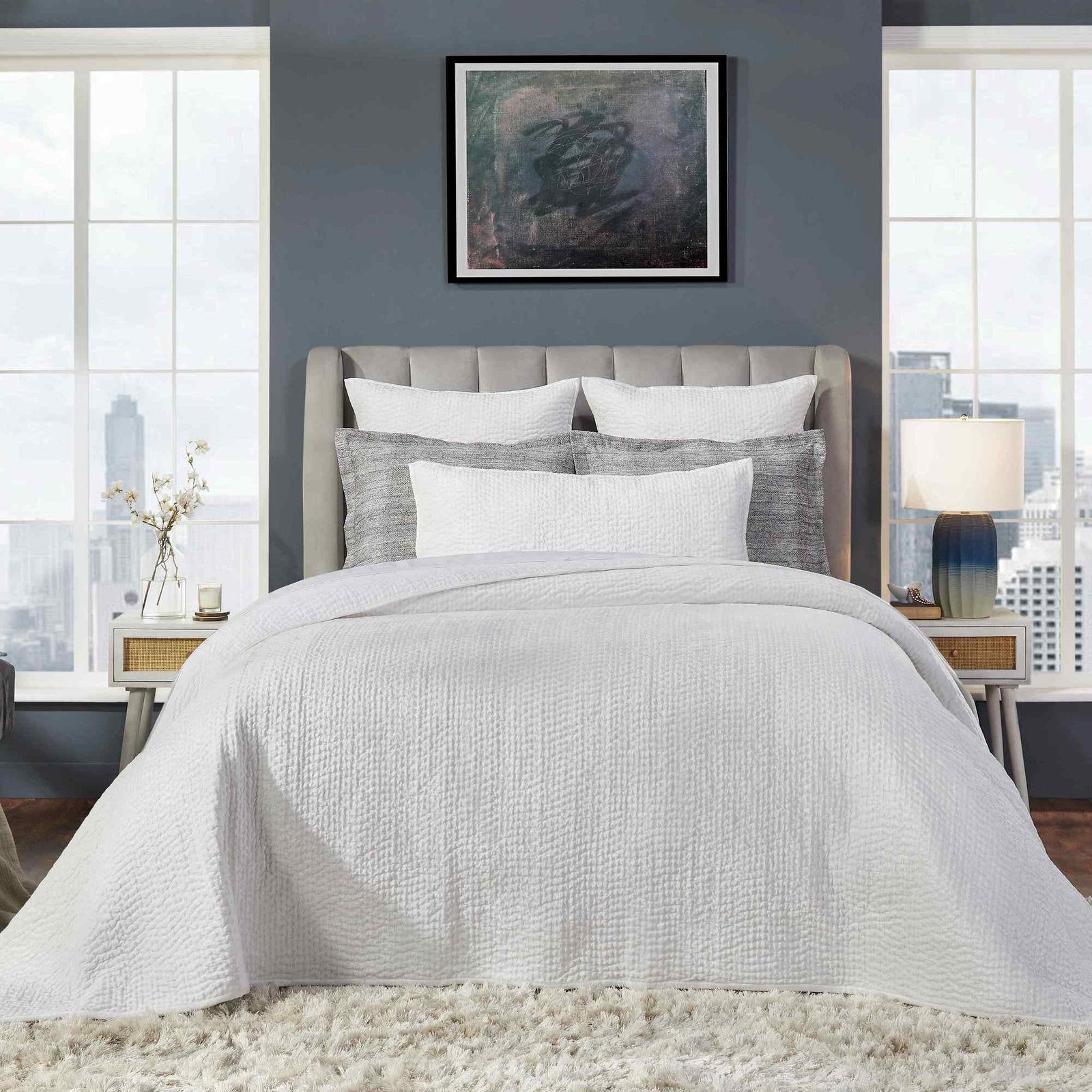 CL-182-9496_1|White textured coverlet on a king bed, elegant quilted bedding for a serene and luxurious sleep space. (119 chars)