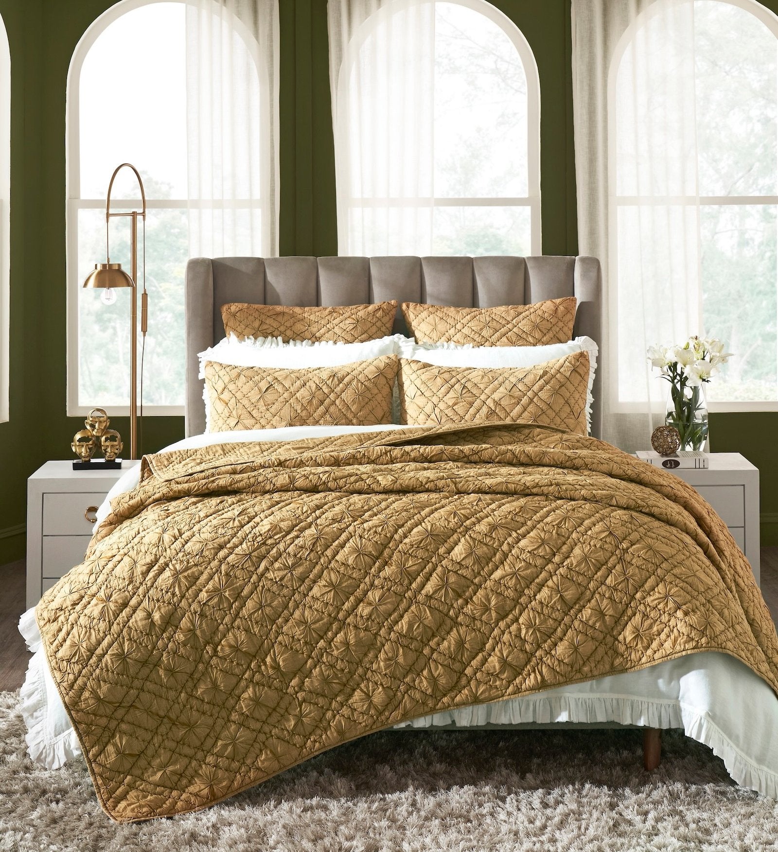 QT-364-11096_1|Lavish gold quilted coverlet and matching shams adorn a plush bed, adding opulence and warmth to the bedroom decor.