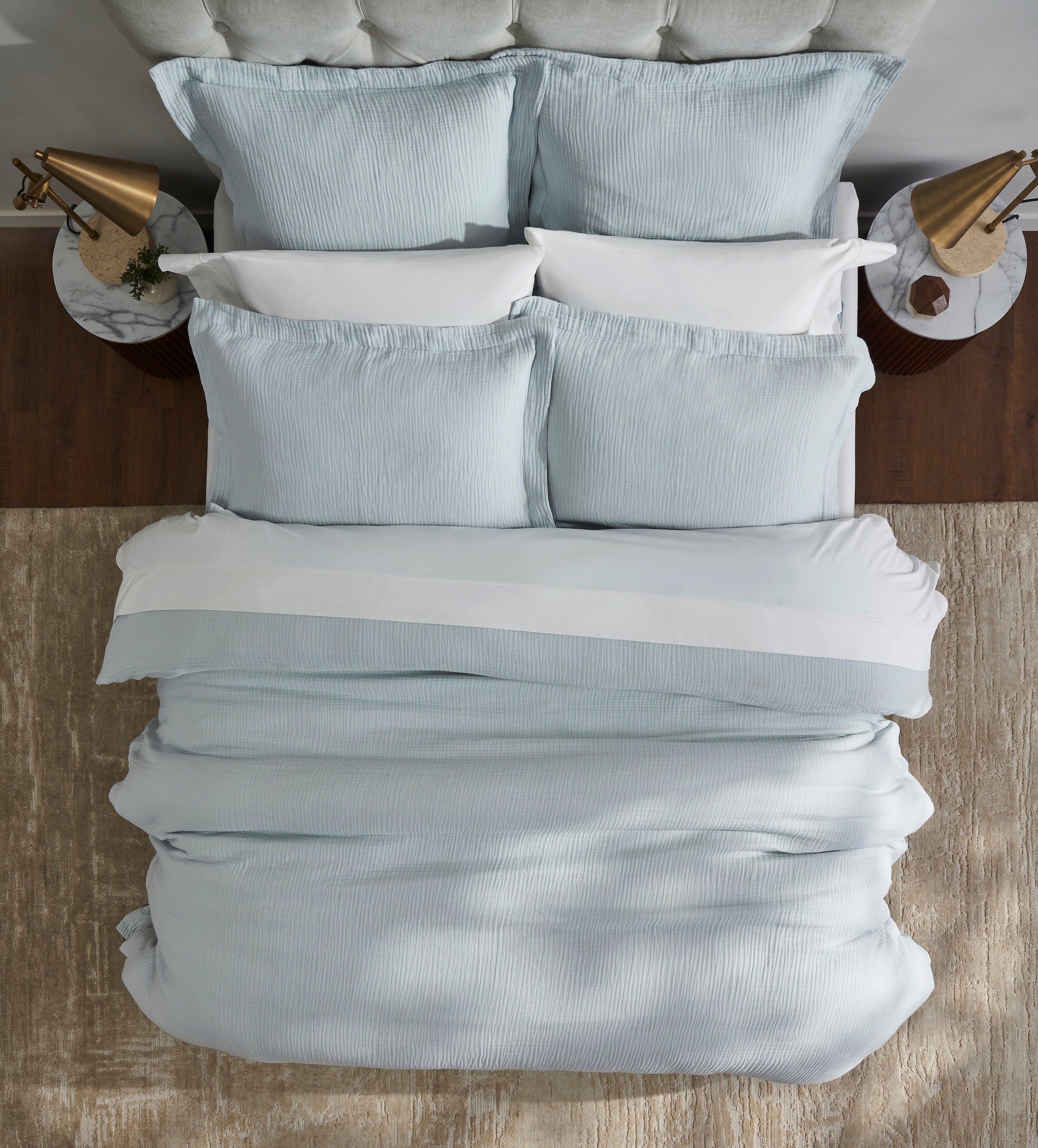 DT-050-9092_5|Overhead view of a light blue textured duvet cover, highlighting its soft fabric and inviting comfort for a restful sleep.