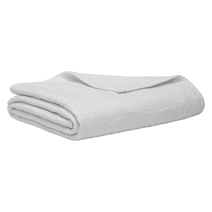 QT-376-9496_8|Neatly folded white quilted blanket, geometric pattern. Ideal for modern bedroom style, elegant and space-saving bedding.