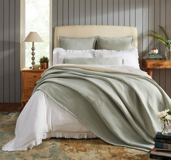 BT-106-11096_4|Serene sage green textured blanket draped over a cozy bed, enhancing bedroom comfort and adding a calming, natural touch.