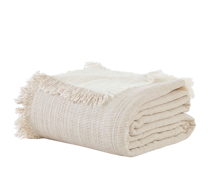 BT-112-11096_4|Neatly folded light brown textured blanket with stylish fringe edges, perfect for adding cozy comfort to any space.