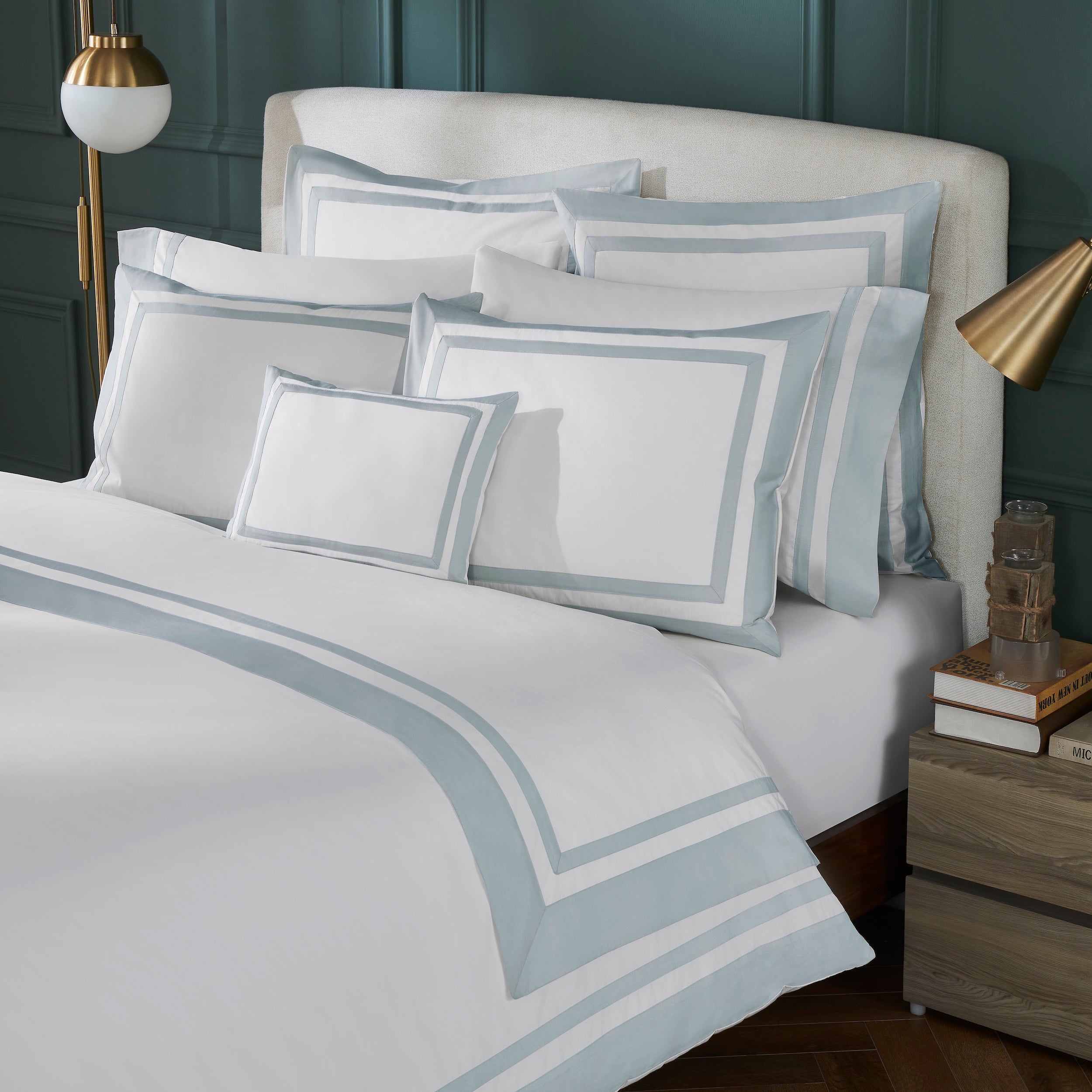 DT-063-9092_2|Luxurious white duvet cover with elegant light blue trimmed borders, enhancing a modern bedroom's sophisticated aesthetic.