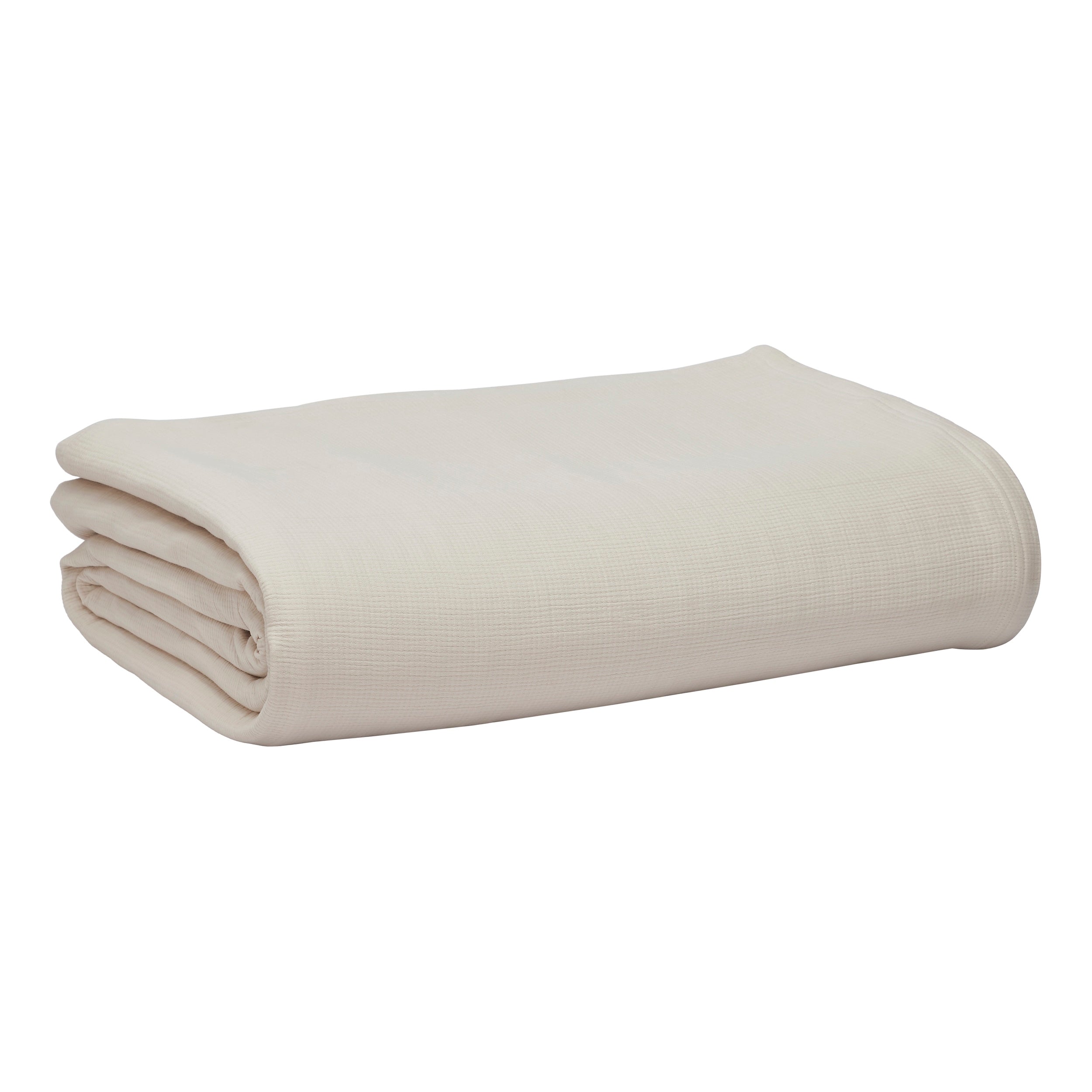 BL-860-9496_7|Stacked light beige waffle weave blanket, neatly folded for storage or display, showcasing its clean texture and versatility.