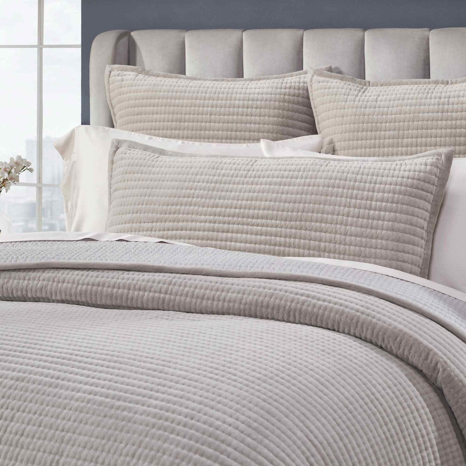 CL-188-11096_5|Close-up of a grey quilted coverlet and matching pillow sham, exhibiting a delicate channel quilt texture.