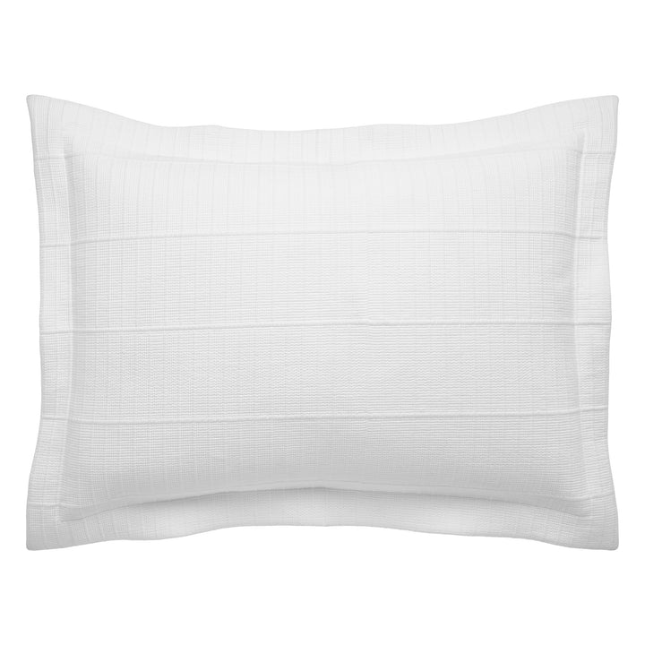 SS-268-2026_1|Crisp white quilted coverlet sham, offering clean lines and subtle texture for a modern and inviting bedroom look.