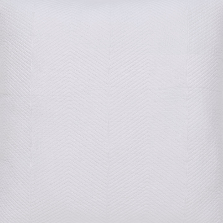ES-170-2626_2|Detail of white chevron quilted coverlet. Elegant, textured bedding for a modern and sophisticated bedroom style.