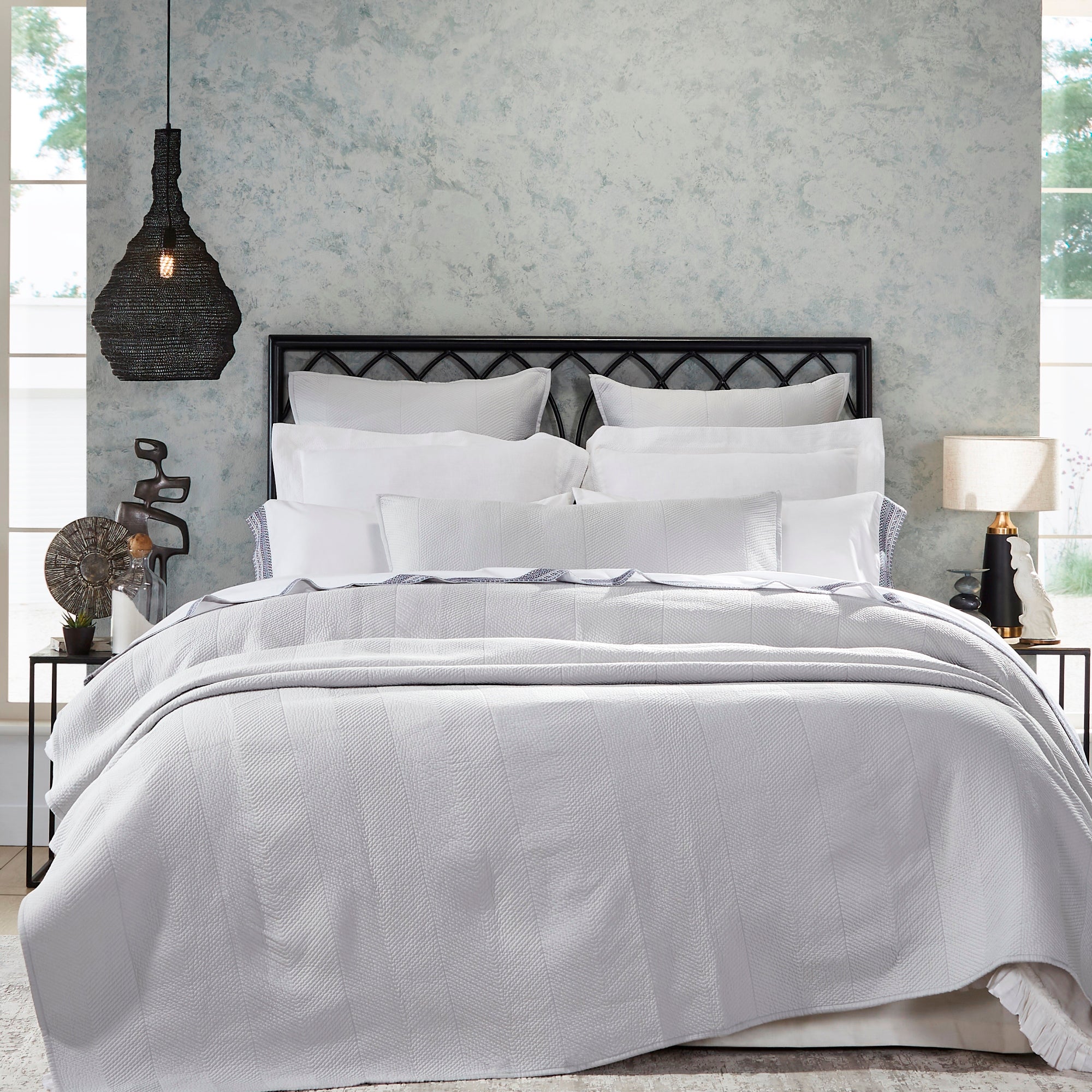 CL-172-11096_1|Elegant light grey quilted coverlet with a modern herringbone pattern on a serene bed in a stylish bedroom setting.