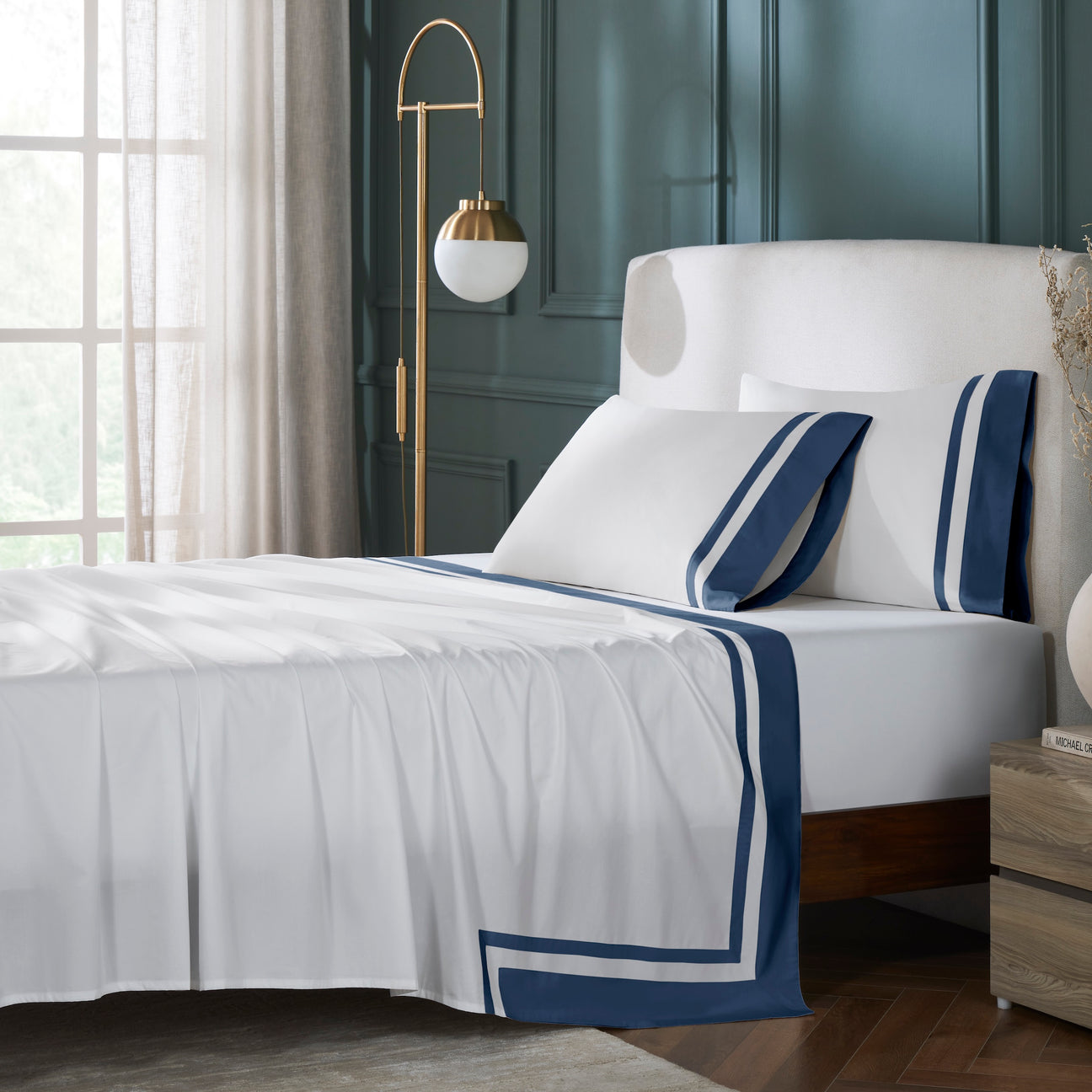 TFL-548-3980_1|Elegant white 100% cotton sheets with navy blue stripes on a bed. Soft, breathable, luxurious hotel bedding set.