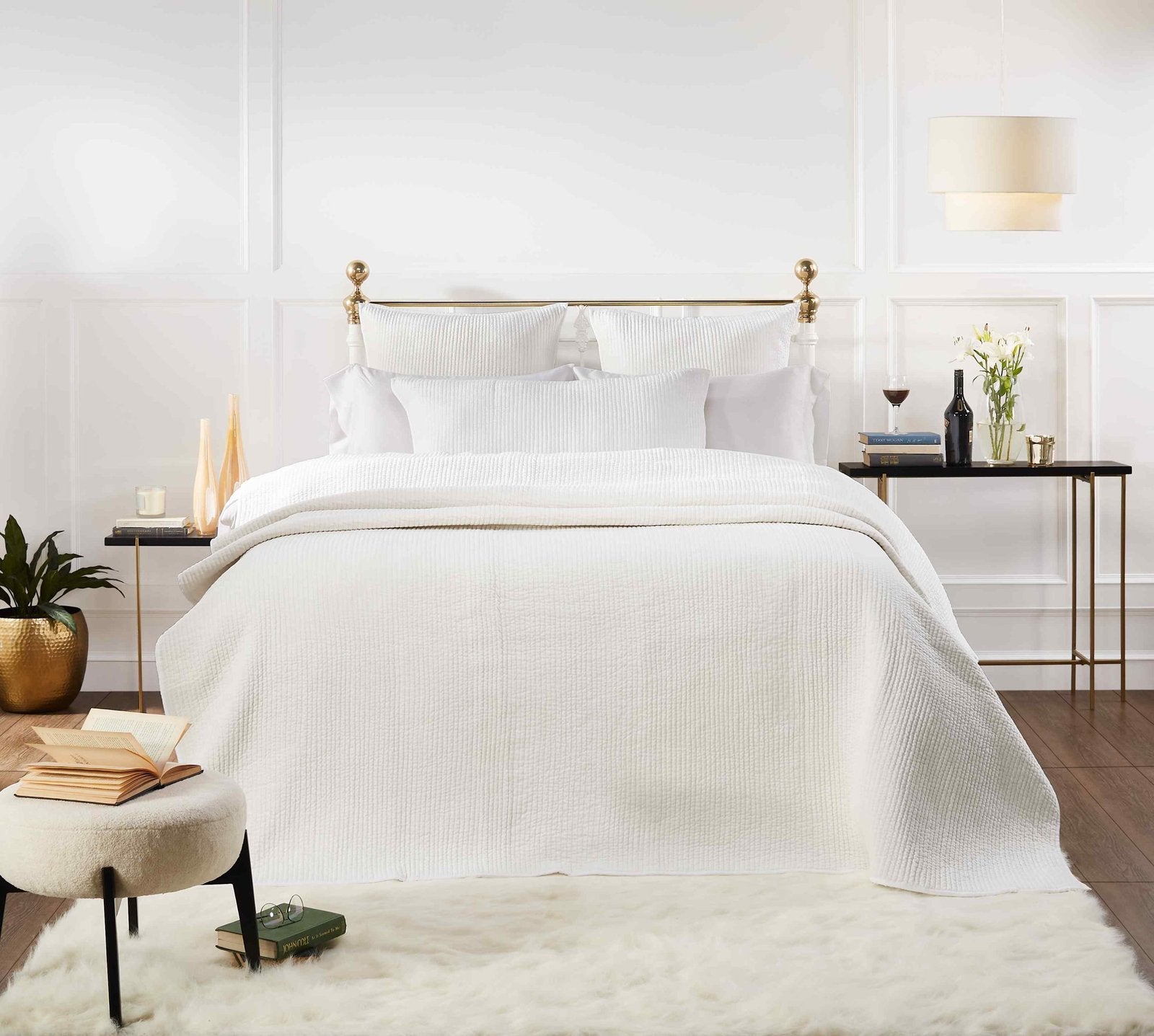 CL-157-11898_4|Crisp white textured coverlet on a luxurious bed, offering a serene, elegant touch to modern bedroom decor.
