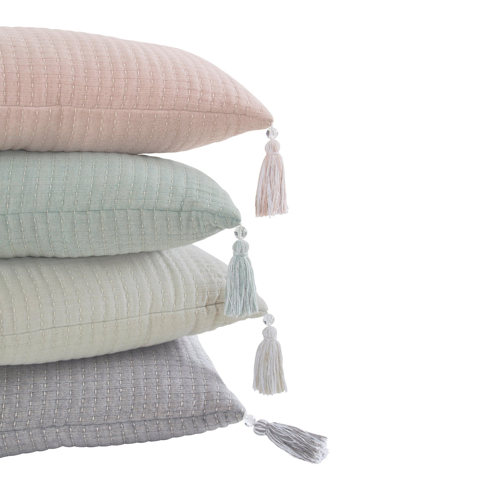 TP-105-1440_1|Stacked pastel decorative pillows: pink, mint, cream, and gray with elegant tassels, adding textured charm to any room.