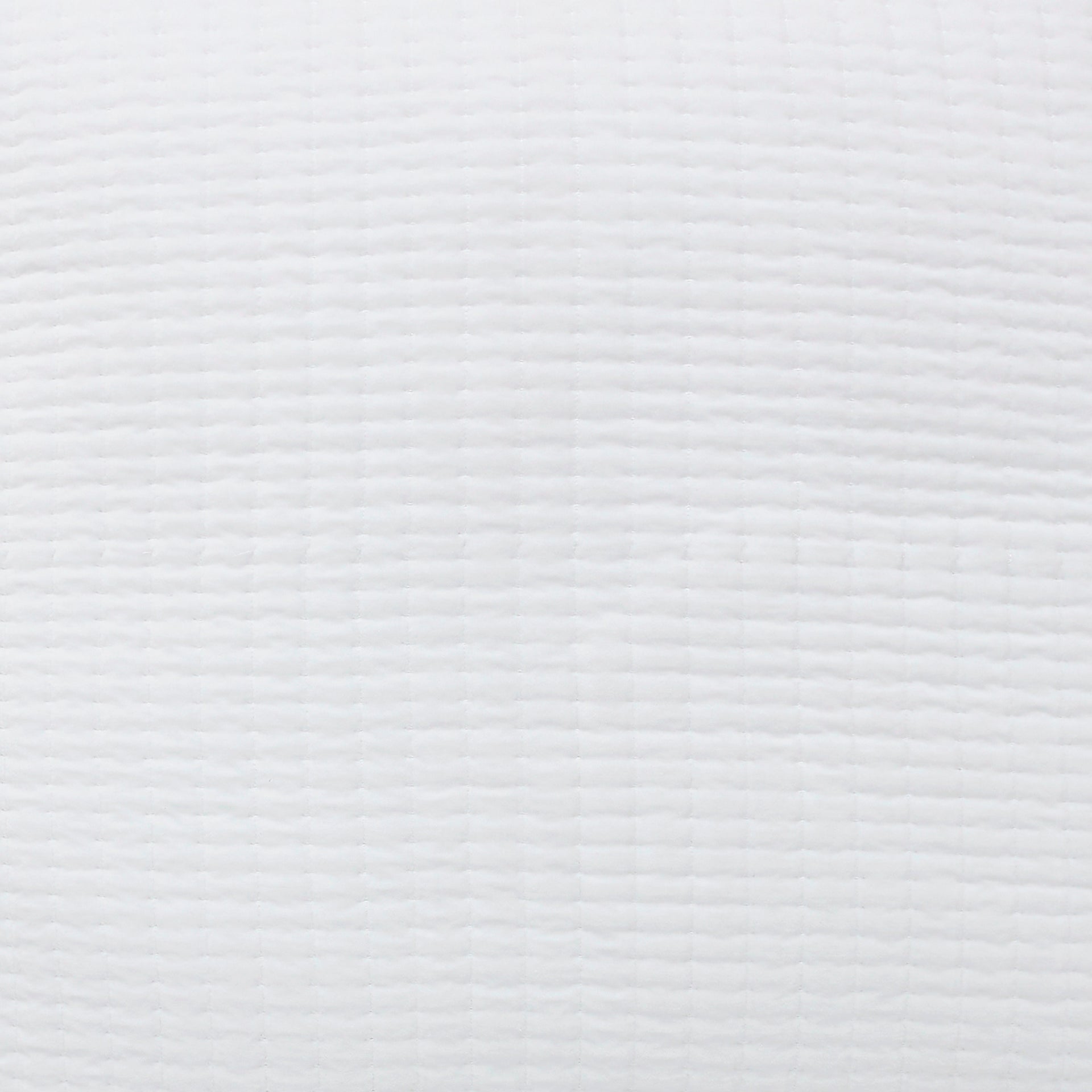 SWT-187-7.8_1|Pure white quilted fabric with delicate horizontal stitching and subtle puckered texture, ideal for bedding or throws.