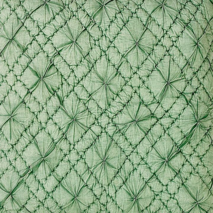 SWT-366-7.8_1|Elegant light green quilted pillow fabric with intricate smocked diamond pattern, perfect for luxurious home decor accent.