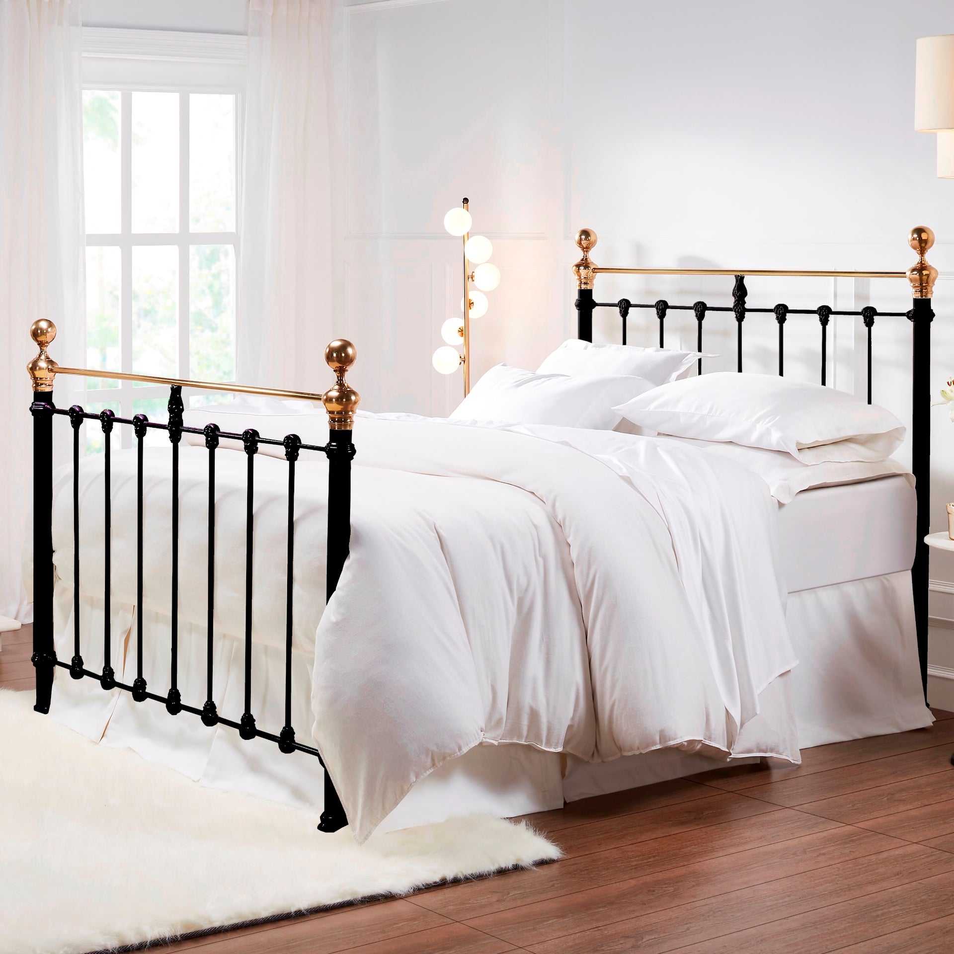 MB-205-6080_1|Elegant black metal bed frame with striking brass finials, combining classic and luxurious elements for a sophisticated bedroom.