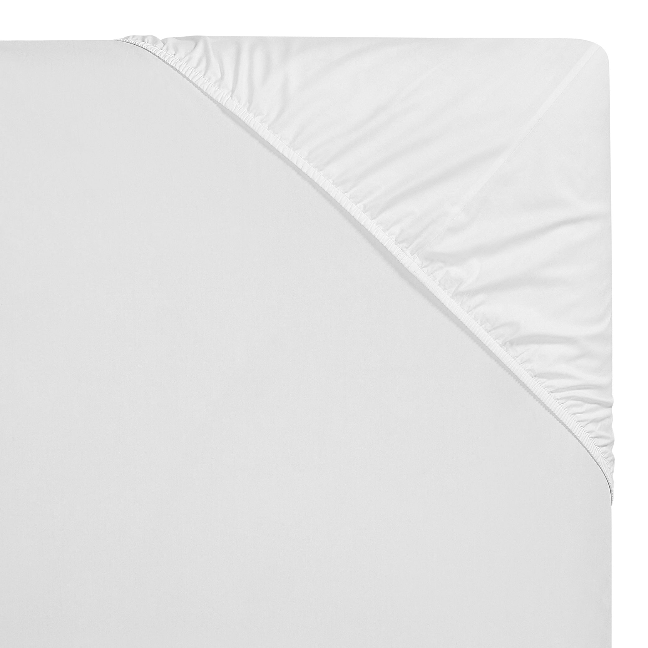 KSS-539-7880_4|Close-up of a crisp white 100% cotton fitted sheet with elastic corners, ensuring a secure and perfect fit for your mattress.